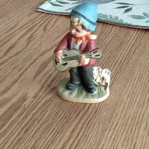 Antique boy/quitar statue